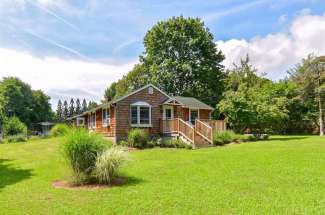 Immaculate Cedar Shake Shelter Island Farmhouse with Gardens