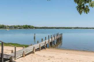 Sunny Shelter Island Beach House with Dock