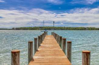 Shelter Island 1937 Cape Cod Harborfront with Deepwater Dock